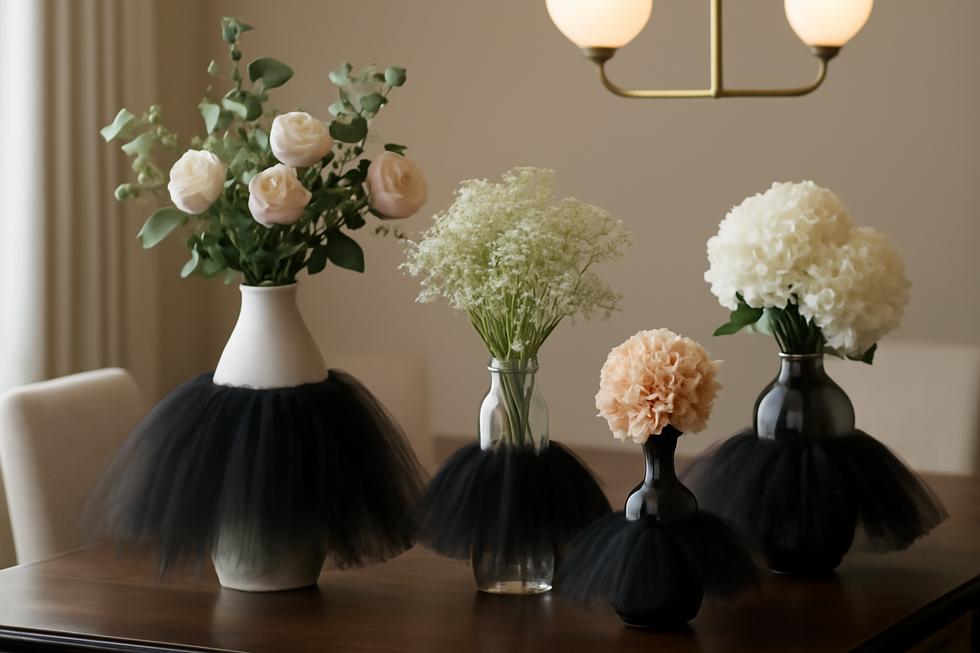 Several vases decorated with black tulle tutu skirts, showcasing elegance and creativity.