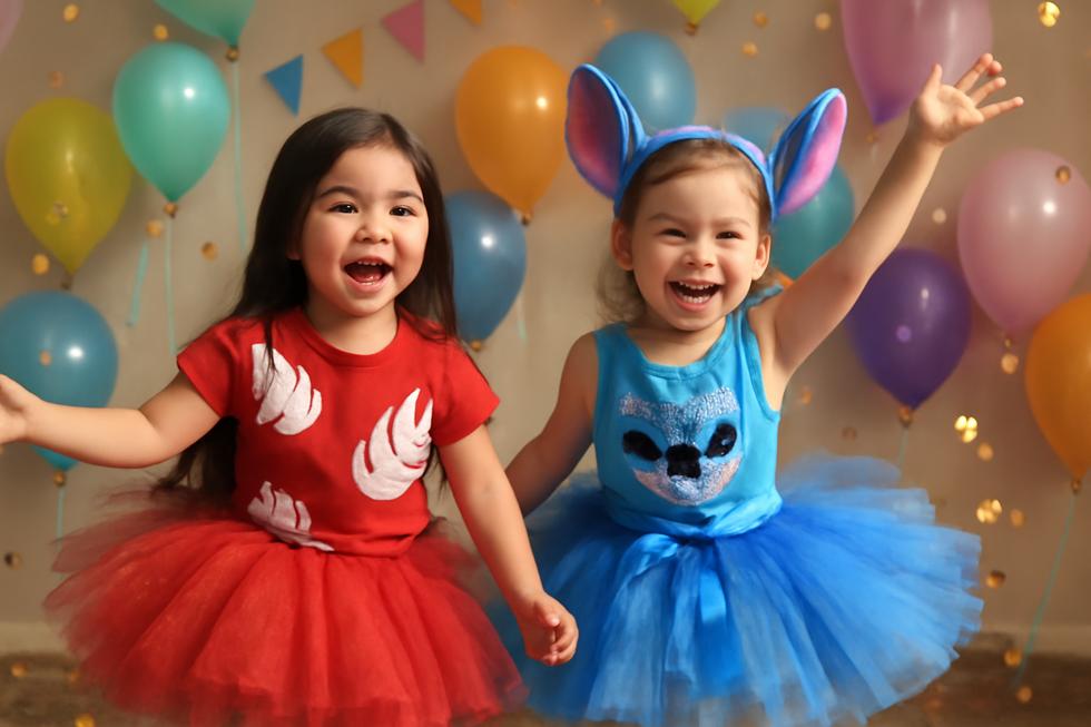 Young children having fun at a party wearing colorful Lilo and Stitch tutu costumes.
